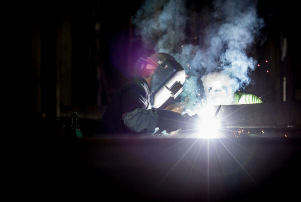 two guys welding