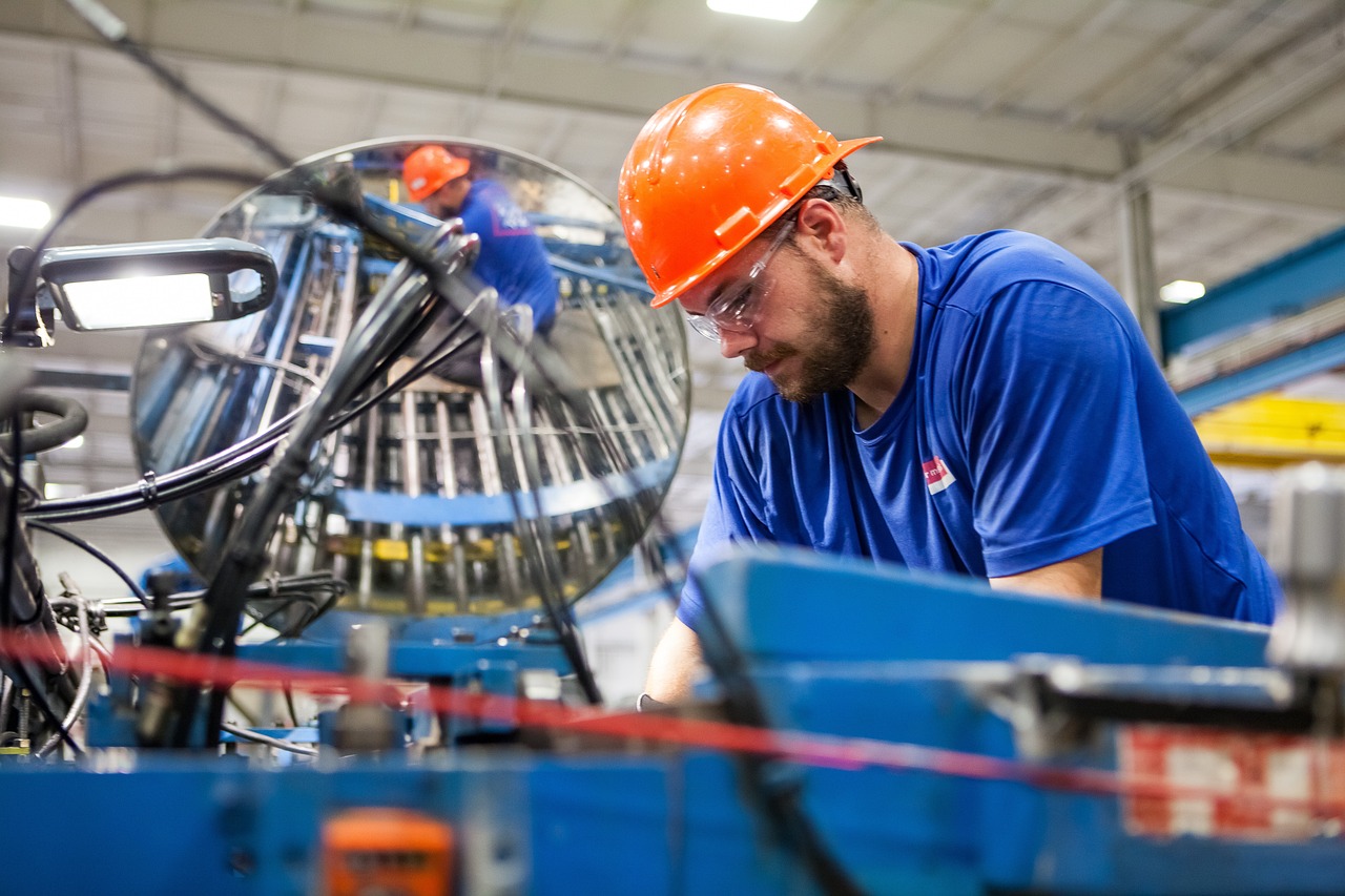 man maintaining press